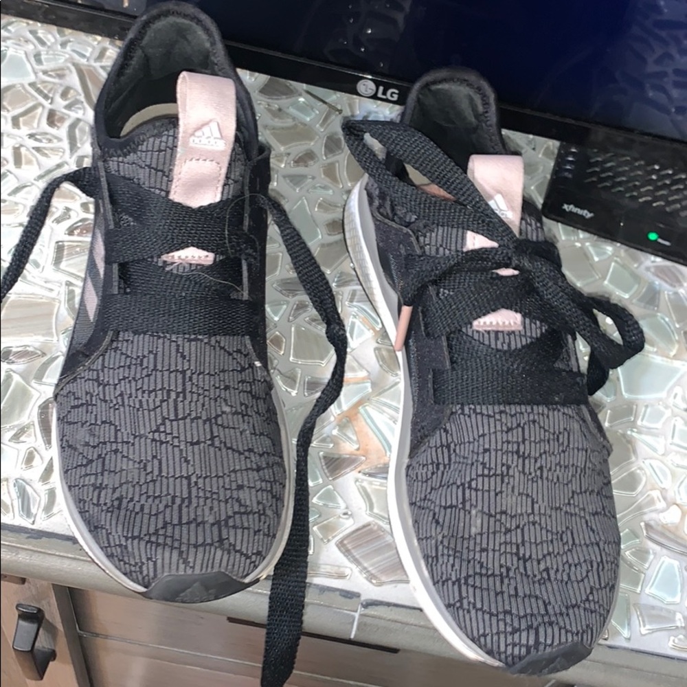 Women’s 6 1/2 adidas shoes.